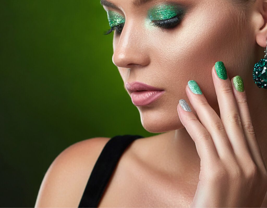 beautiful brunette with shiny green makeup touchin utc